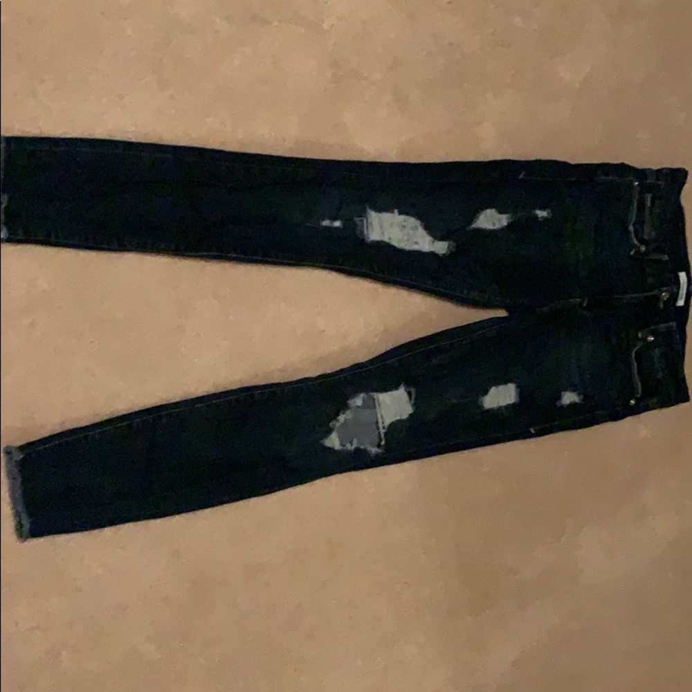 I’m selling a pair of denim ripped jeans.